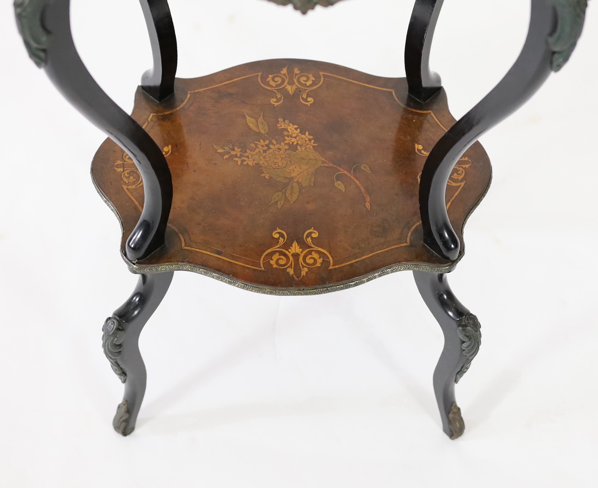 A 19th century French walnut and marquetry porcelain mounted two tier table, width 48cm, depth 35cm, height 88cm